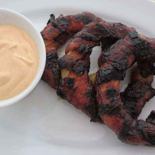 Bacon-Wrapped Sriracha Onion Rings