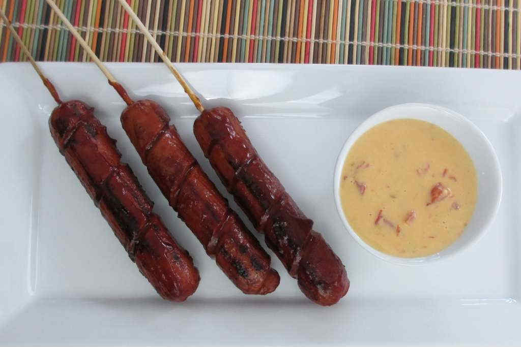 Spiral Hot Dogs with Queso Sauce