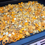 Spicy Chex Mix using an Outdoor Griddle